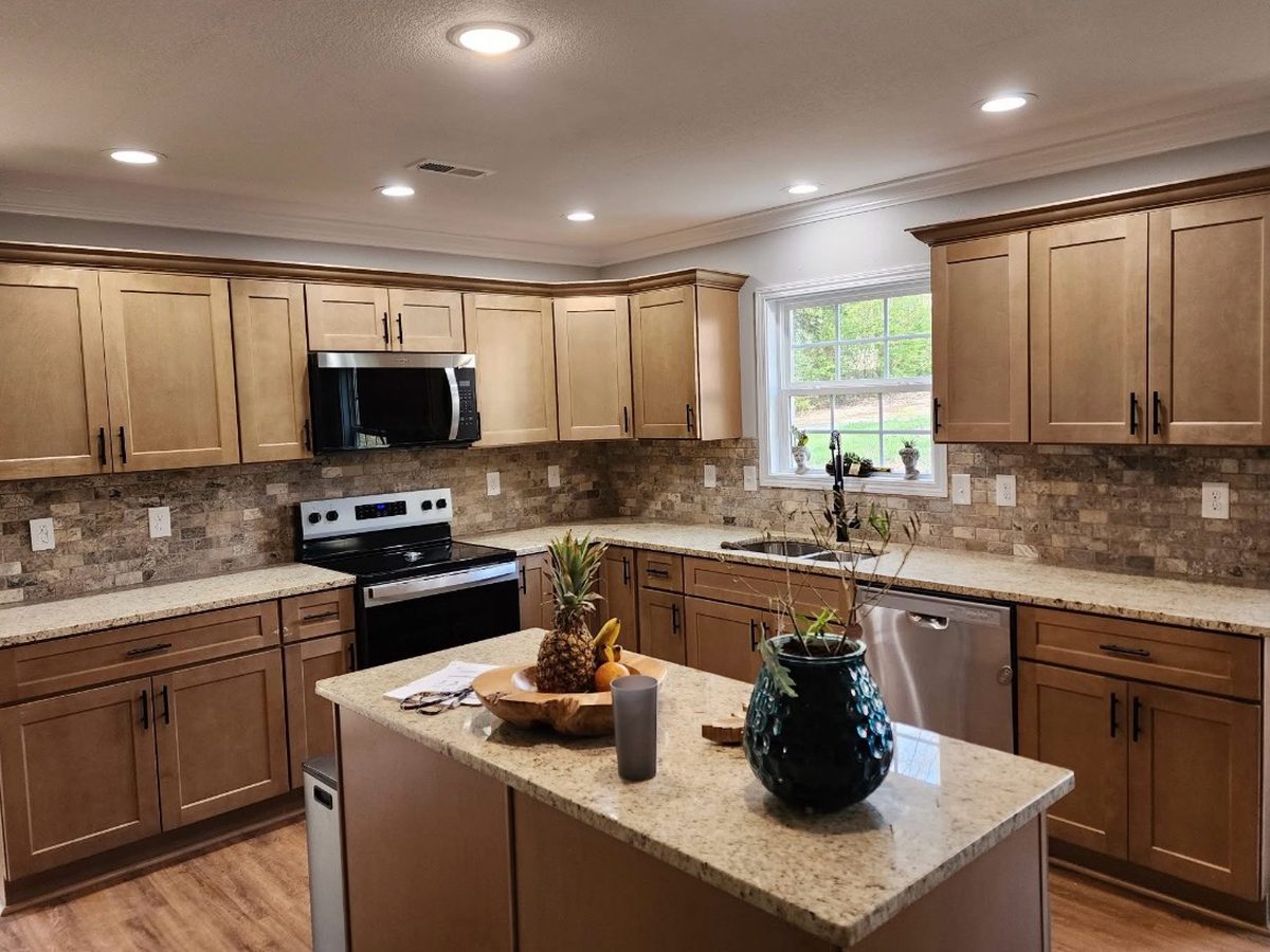 After: kitchen with a stacked stone tile backsplash
